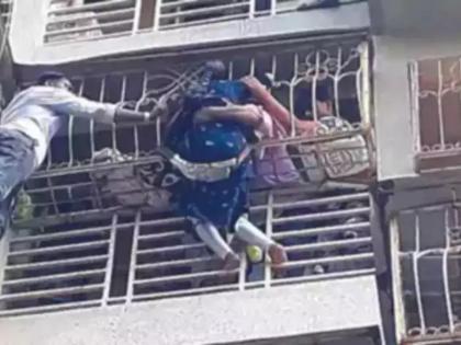 Mumbai: Woman falls off balcony after feeling dizzy, holds on to grille of flat below | Mumbai: Woman falls off balcony after feeling dizzy, holds on to grille of flat below Mumbai: Woman falls off balcony after feeling dizzy, holds on to grille of flat below | Mumbai: Woman falls off balcony after feeling dizzy, holds on to grille of flat below