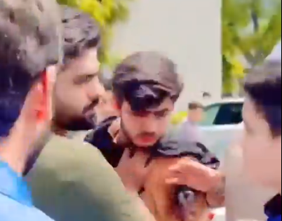Babar Azam Engages in Ugly Fight With Fans on Street, Pushes Man To Make Way Through Crowd; Video Goes Viral | Babar Azam Engages in Ugly Fight With Fans on Street, Pushes Man To Make Way Through Crowd; Video Goes Viral