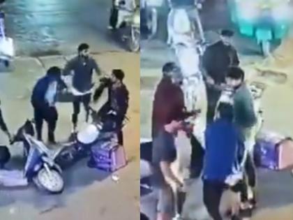 Road Rage in Bengaluru: Delivery Boy Attacked with Helmet After Minor Collision in Mahadevapura Area, CCTV Video Surfaces | Road Rage in Bengaluru: Delivery Boy Attacked with Helmet After Minor Collision in Mahadevapura Area, CCTV Video Surfaces Road Rage in Bengaluru: Delivery Boy Attacked with Helmet After Minor Collision in Mahadevapura Area, CCTV Video Surfaces | Road Rage in Bengaluru: Delivery Boy Attacked with Helmet After Minor Collision in Mahadevapura Area, CCTV Video Surfaces