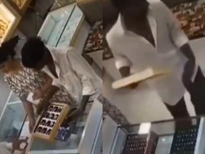 Thane: Robber Posing as Customer Steals Gold Jewellery Tray Worth ₹2.4 Lakh near Bhiwandi; CCTV Footage Surfaces | Thane: Robber Posing as Customer Steals Gold Jewellery Tray Worth ₹2.4 Lakh near Bhiwandi; CCTV Footage Surfaces Thane: Robber Posing as Customer Steals Gold Jewellery Tray Worth ₹2.4 Lakh near Bhiwandi; CCTV Footage Surfaces | Thane: Robber Posing as Customer Steals Gold Jewellery Tray Worth ₹2.4 Lakh near Bhiwandi; CCTV Footage Surfaces