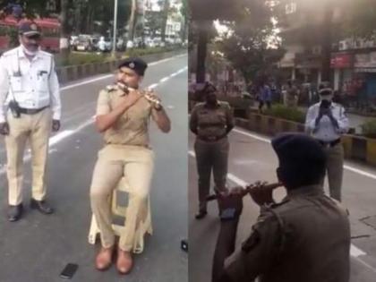 Viral Video! Mumbai Police Constable plays 'Sandese Aate Hai' from 'Border' on flute | Viral Video! Mumbai Police Constable plays 'Sandese Aate Hai' from 'Border' on flute