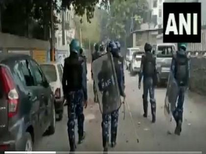 Delhi Police, RAF hold flag march in Brahampuri area | Delhi Police, RAF hold flag march in Brahampuri area Delhi Police, RAF hold flag march in Brahampuri area | Delhi Police, RAF hold flag march in Brahampuri area