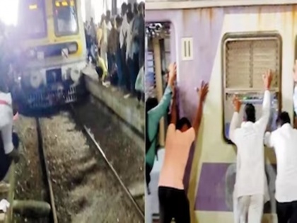 Navi Mumbai: Passengers Move Train Coach to Save Man Stuck on the Tracks | Navi Mumbai: Passengers Move Train Coach to Save Man Stuck on the Tracks