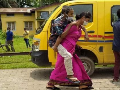 Woman carries covid positive father-in-law to hospital on her back | Woman carries covid positive father-in-law to hospital on her back