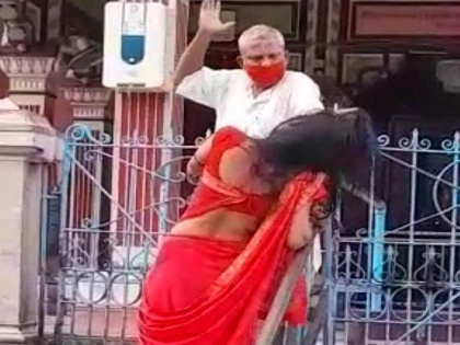 Shocking! Priest thrashes woman devotee after she demands to open temple for worship | Shocking! Priest thrashes woman devotee after she demands to open temple for worship