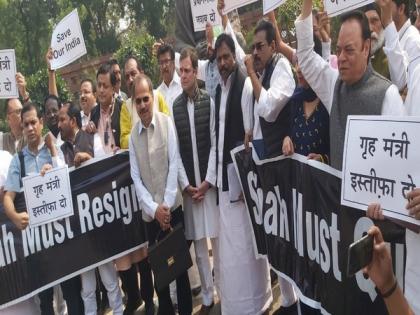 Congress MPs stage protest in Parliament House compound over Delhi violence | Congress MPs stage protest in Parliament House compound over Delhi violence Congress MPs stage protest in Parliament House compound over Delhi violence | Congress MPs stage protest in Parliament House compound over Delhi violence