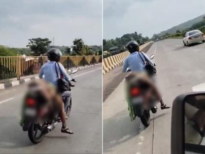 Nagpur: Helpless Man Ties Wife’s Dead Body to Bike to Take Hometown After Accident; Disturbing Video Goes Viral | Nagpur: Helpless Man Ties Wife’s Dead Body to Bike to Take Hometown After Accident; Disturbing Video Goes Viral Nagpur: Helpless Man Ties Wife’s Dead Body to Bike to Take Hometown After Accident; Disturbing Video Goes Viral | Nagpur: Helpless Man Ties Wife’s Dead Body to Bike to Take Hometown After Accident; Disturbing Video Goes Viral