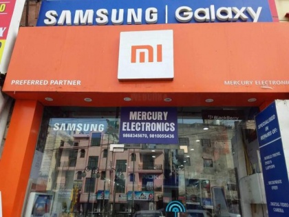 Chinese electronics firm Xiaomi hides its logo and sign boards with the 'Made in India' tag | Chinese electronics firm Xiaomi hides its logo and sign boards with the 'Made in India' tag