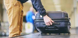 Govt urges airlines to introduce one handbag rule to ease airport chaos | Govt urges airlines to introduce one handbag rule to ease airport chaos