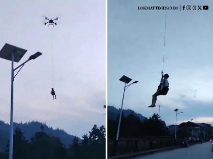 Chinese Drone Airlifts Man Stuck in Guangxi Floods; Video Goes Viral | Chinese Drone Airlifts Man Stuck in Guangxi Floods; Video Goes Viral Chinese Drone Airlifts Man Stuck in Guangxi Floods; Video Goes Viral | Chinese Drone Airlifts Man Stuck in Guangxi Floods; Video Goes Viral