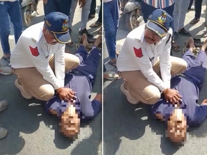 Gujarat Cop Saves Man's Life By Giving Him CPR (Watch Video) | Gujarat Cop Saves Man's Life By Giving Him CPR (Watch Video)