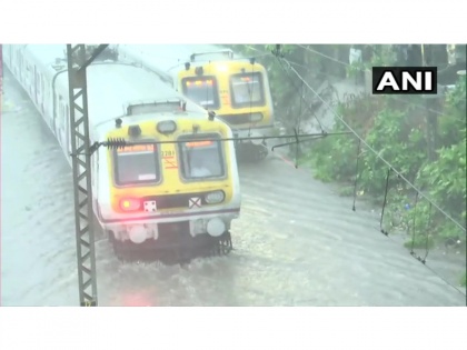 Mumbai local train services suspended due to heavy rainfall and waterlogging | Mumbai local train services suspended due to heavy rainfall and waterlogging