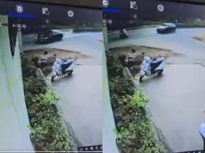 Gandhinagar Accident: BMW Hits Scooter , Rider Dies on Spot; Driver Seriously Injured (Watch Video) | Gandhinagar Accident: BMW Hits Scooter , Rider Dies on Spot; Driver Seriously Injured (Watch Video)