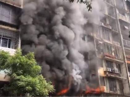 Mumbai: Massive fire breaks out at residential building In Kandivali's Mahaveer Nagar, injuries reported | Mumbai: Massive fire breaks out at residential building In Kandivali's Mahaveer Nagar, injuries reported Mumbai: Massive fire breaks out at residential building In Kandivali's Mahaveer Nagar, injuries reported | Mumbai: Massive fire breaks out at residential building In Kandivali's Mahaveer Nagar, injuries reported