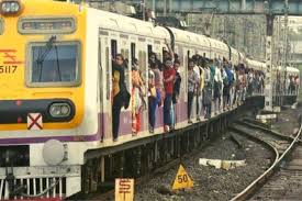 Maharashtra: Commuters perform Yoga inside Mumbai local trains | Maharashtra: Commuters perform Yoga inside Mumbai local trains