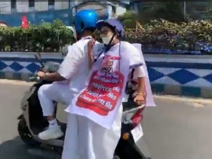 Mamata Banerjee travels in electric scooter to protest against rising fuel prices | Mamata Banerjee travels in electric scooter to protest against rising fuel prices