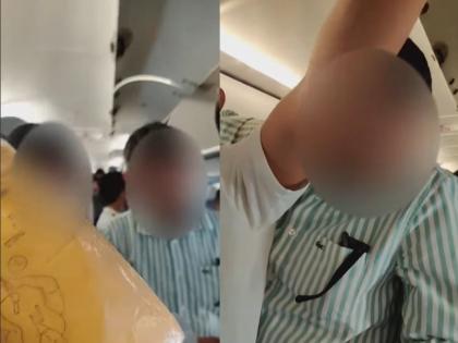 Watch: IndiGo Co-Passenger Busts Man for Stealing on Flight Life Jacket, Video Goes Viral | Watch: IndiGo Co-Passenger Busts Man for Stealing on Flight Life Jacket, Video Goes Viral