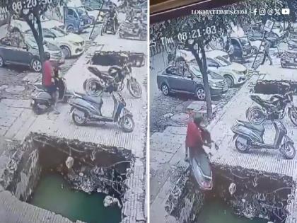 Ghaziabad: Man Falls Into Open Drain With Scooter in Indirapuram, Rescued Using Ladder; CCTV Video Goes Viral | Ghaziabad: Man Falls Into Open Drain With Scooter in Indirapuram, Rescued Using Ladder; CCTV Video Goes Viral Ghaziabad: Man Falls Into Open Drain With Scooter in Indirapuram, Rescued Using Ladder; CCTV Video Goes Viral | Ghaziabad: Man Falls Into Open Drain With Scooter in Indirapuram, Rescued Using Ladder; CCTV Video Goes Viral