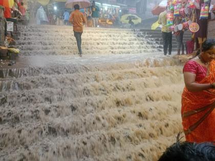 Watch: Jejuri Temple Steps Turns Into a Waterfall Due to Heavy Rain, Leaving Devotees Stranded | Watch: Jejuri Temple Steps Turns Into a Waterfall Due to Heavy Rain, Leaving Devotees Stranded Watch: Jejuri Temple Steps Turns Into a Waterfall Due to Heavy Rain, Leaving Devotees Stranded | Watch: Jejuri Temple Steps Turns Into a Waterfall Due to Heavy Rain, Leaving Devotees Stranded
