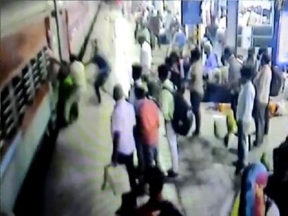 VIDEO! RPF staff saves pregnant woman who slipped while attempting to de-board moving train | VIDEO! RPF staff saves pregnant woman who slipped while attempting to de-board moving train