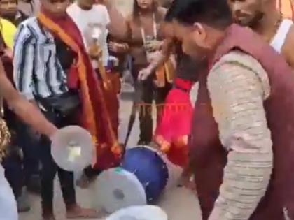 Uttarakhand: Playing Drums in Kedarnath Dham Appropriate? Questions Raised After Video of Priest Throwing Drums Goes Viral | Uttarakhand: Playing Drums in Kedarnath Dham Appropriate? Questions Raised After Video of Priest Throwing Drums Goes Viral
