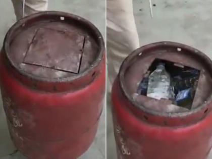 Bihar: Liquor Smuggled Inside LPG Cylinder in Gopalganj; Video Goes Viral | Bihar: Liquor Smuggled Inside LPG Cylinder in Gopalganj; Video Goes Viral Bihar: Liquor Smuggled Inside LPG Cylinder in Gopalganj; Video Goes Viral | Bihar: Liquor Smuggled Inside LPG Cylinder in Gopalganj; Video Goes Viral