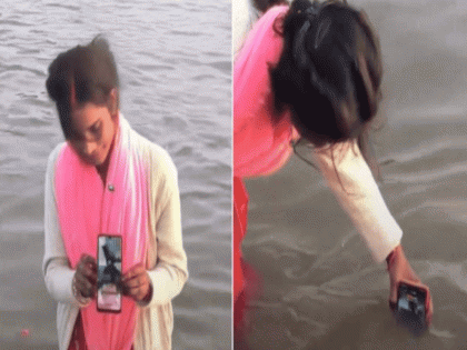 Maha Kumbh Mela 2025: Woman Performs ‘Online Snan’ for Husband by Dipping Phone in Triveni Sangam, Internet Reacts | Maha Kumbh Mela 2025: Woman Performs ‘Online Snan’ for Husband by Dipping Phone in Triveni Sangam, Internet Reacts Maha Kumbh Mela 2025: Woman Performs ‘Online Snan’ for Husband by Dipping Phone in Triveni Sangam, Internet Reacts | Maha Kumbh Mela 2025: Woman Performs ‘Online Snan’ for Husband by Dipping Phone in Triveni Sangam, Internet Reacts