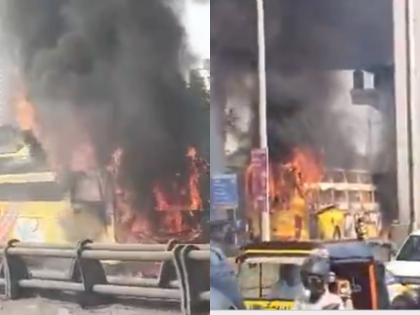 Malad: Private Bus Catches Fire on Western Express Highway Due to Suspected Short Circuit (Watch Video) | Malad: Private Bus Catches Fire on Western Express Highway Due to Suspected Short Circuit (Watch Video) Malad: Private Bus Catches Fire on Western Express Highway Due to Suspected Short Circuit (Watch Video) | Malad: Private Bus Catches Fire on Western Express Highway Due to Suspected Short Circuit (Watch Video)