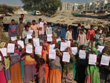 45 families in Gujarat slum asked to vacate their lands ahead of Donald Trump's arrival in Ahmedabad | 45 families in Gujarat slum asked to vacate their lands ahead of Donald Trump's arrival in Ahmedabad