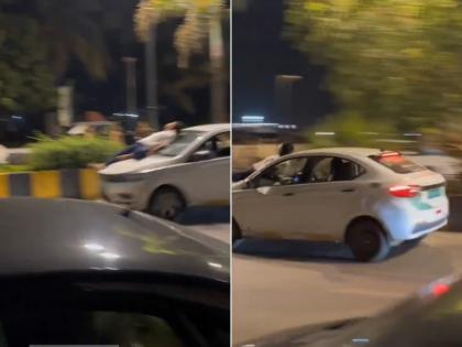 Mumbai Viral Video: Two Arrested After Man Seen Lying on Speeding Car Bonnet (Watch) | Mumbai Viral Video: Two Arrested After Man Seen Lying on Speeding Car Bonnet (Watch) Mumbai Viral Video: Two Arrested After Man Seen Lying on Speeding Car Bonnet (Watch) | Mumbai Viral Video: Two Arrested After Man Seen Lying on Speeding Car Bonnet (Watch)