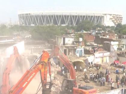 Ahmedabad: AMC Demolishes 29 Houses Near Narendra Modi Stadium Ahead of Commonwealth Games | Ahmedabad: AMC Demolishes 29 Houses Near Narendra Modi Stadium Ahead of Commonwealth Games Ahmedabad: AMC Demolishes 29 Houses Near Narendra Modi Stadium Ahead of Commonwealth Games | Ahmedabad: AMC Demolishes 29 Houses Near Narendra Modi Stadium Ahead of Commonwealth Games