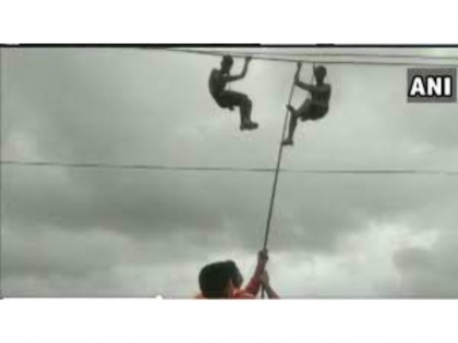 Viral Video! NDRF rescued 2 Power dept staff hanging on power cables | Viral Video! NDRF rescued 2 Power dept staff hanging on power cables