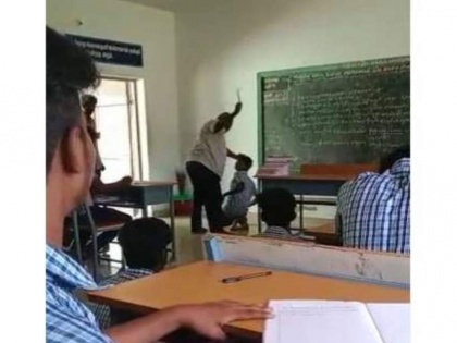 Video! Teacher beats student with stick, kicks him with leg for not coming to school regularly | Video! Teacher beats student with stick, kicks him with leg for not coming to school regularly