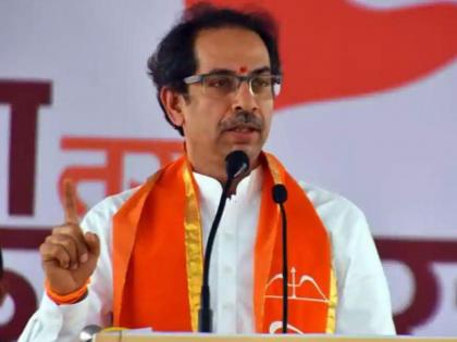 Uddhav Thackeray takes a dig at Shinde govt says, Saffron flag has to be in one's heart not just hands | Uddhav Thackeray takes a dig at Shinde govt says, Saffron flag has to be in one's heart not just hands