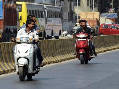 Mumbai: Persons riding 2-wheeler and pillion urged to wear a helmet | Mumbai: Persons riding 2-wheeler and pillion urged to wear a helmet