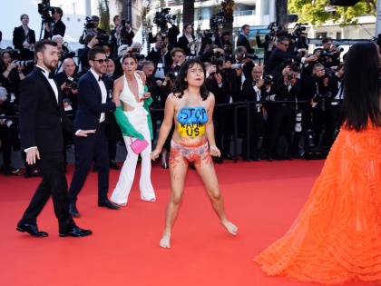 Ukraine Russia Conflict: Woman goes naked on Cannes red carpet to protest against sexual violence in Ukraine by Russia | Ukraine Russia Conflict: Woman goes naked on Cannes red carpet to protest against sexual violence in Ukraine by Russia