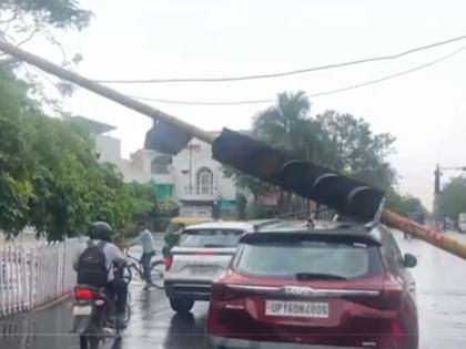 Watch: Traffic Pole Crashes Into Car in Noida's Sector 27 Following Heavy Rain (Watch Video) | Watch: Traffic Pole Crashes Into Car in Noida's Sector 27 Following Heavy Rain (Watch Video) Watch: Traffic Pole Crashes Into Car in Noida's Sector 27 Following Heavy Rain (Watch Video) | Watch: Traffic Pole Crashes Into Car in Noida's Sector 27 Following Heavy Rain (Watch Video)