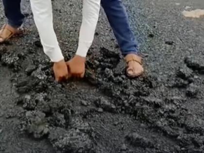 Watch: Nanded Man Tears Tar Road With Bare Hands, Exposes Poor Construction | Watch: Nanded Man Tears Tar Road With Bare Hands, Exposes Poor Construction Watch: Nanded Man Tears Tar Road With Bare Hands, Exposes Poor Construction | Watch: Nanded Man Tears Tar Road With Bare Hands, Exposes Poor Construction