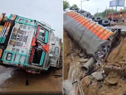 Gurugram: Truck Carrying Beer Bottles Falls Into Pit After Road Caves-in Due to Heavy Rainfall; Work From Home Advisory Issued | Gurugram: Truck Carrying Beer Bottles Falls Into Pit After Road Caves-in Due to Heavy Rainfall; Work From Home Advisory Issued