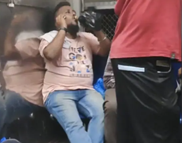 Watch: Passenger spotted consuming alcohol in Mumbai local train | Watch: Passenger spotted consuming alcohol in Mumbai local train