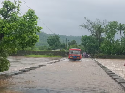 Raigad: ST bus drives through floodwaters, passengers' lives at risk | Raigad: ST bus drives through floodwaters, passengers' lives at risk Raigad: ST bus drives through floodwaters, passengers' lives at risk | Raigad: ST bus drives through floodwaters, passengers' lives at risk