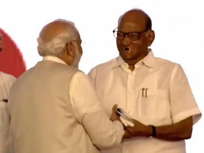 Sharad Pawar's gesture sparks debate during PM Modi's Pune visit | Sharad Pawar's gesture sparks debate during PM Modi's Pune visit Sharad Pawar's gesture sparks debate during PM Modi's Pune visit | Sharad Pawar's gesture sparks debate during PM Modi's Pune visit