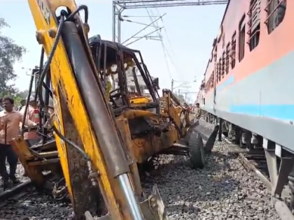 Banaras-Mumbai Express Narrowly Escapes Major Accident After Colliding with JCB in Mughalsarai - WATCH | Banaras-Mumbai Express Narrowly Escapes Major Accident After Colliding with JCB in Mughalsarai - WATCH