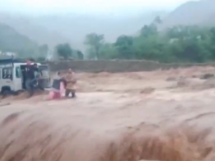 Flash Flood Rescue: Four Saved As Heavy Rains Disrupt in Jammu and Kashmir (Watch) | Flash Flood Rescue: Four Saved As Heavy Rains Disrupt in Jammu and Kashmir (Watch)