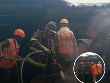 Panic at Thane Station as Fire Breaks Out Near Railway Tracks; Emergency Services Respond Promptly | Panic at Thane Station as Fire Breaks Out Near Railway Tracks; Emergency Services Respond Promptly Panic at Thane Station as Fire Breaks Out Near Railway Tracks; Emergency Services Respond Promptly | Panic at Thane Station as Fire Breaks Out Near Railway Tracks; Emergency Services Respond Promptly