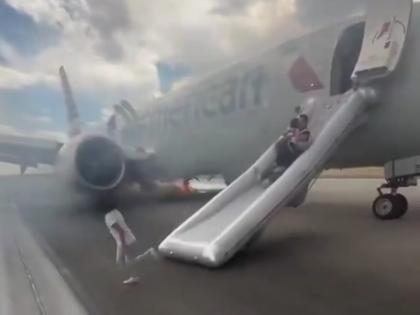 American Airlines Plane Tyre Catches Fire Before Takeoff,Passengers Evacuated Safely | American Airlines Plane Tyre Catches Fire Before Takeoff,Passengers Evacuated Safely American Airlines Plane Tyre Catches Fire Before Takeoff,Passengers Evacuated Safely | American Airlines Plane Tyre Catches Fire Before Takeoff,Passengers Evacuated Safely