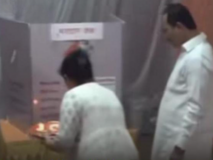 Pune: NCP Candidate, Wife Booked for Performing Puja of EVM During Local Body Elections in Bhor | Pune: NCP Candidate, Wife Booked for Performing Puja of EVM During Local Body Elections in Bhor Pune: NCP Candidate, Wife Booked for Performing Puja of EVM During Local Body Elections in Bhor | Pune: NCP Candidate, Wife Booked for Performing Puja of EVM During Local Body Elections in Bhor