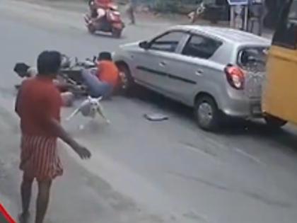 Bike Skids in Tamil Nadu After Dog Appears on Road, Rider and Pillion Survive Narrow Escape (Watch Video) | Bike Skids in Tamil Nadu After Dog Appears on Road, Rider and Pillion Survive Narrow Escape (Watch Video)