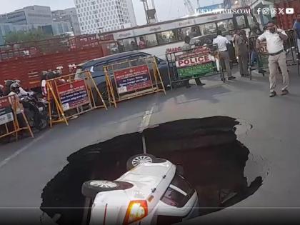 Tamil Nadu: Car Falls Into Large Pothole in Chennai, Driver Escapes Unharmed (Watch Video) | Tamil Nadu: Car Falls Into Large Pothole in Chennai, Driver Escapes Unharmed (Watch Video) Tamil Nadu: Car Falls Into Large Pothole in Chennai, Driver Escapes Unharmed (Watch Video) | Tamil Nadu: Car Falls Into Large Pothole in Chennai, Driver Escapes Unharmed (Watch Video)