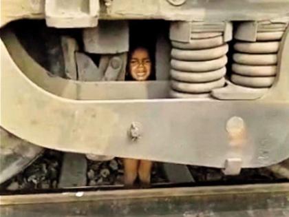 Two-year old boy miraculously escapes unhurt after getting stuck under goods train | Two-year old boy miraculously escapes unhurt after getting stuck under goods train